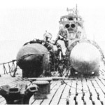 Two-Type I Kaitens strapped to the deck of an IJN I-Class submarine with wooden blocks