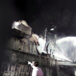 Cptn Pingley directing fire fight -colorized (Sid Harris)