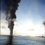 AO59 burning across bay -colorized (Sid Harris)