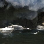 Water sprayed on AO59 amidst smoke 3- colorized (Sid Harris)