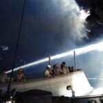 Water sprayed on AO59 amidst smoke - colorized (Sid Harris)